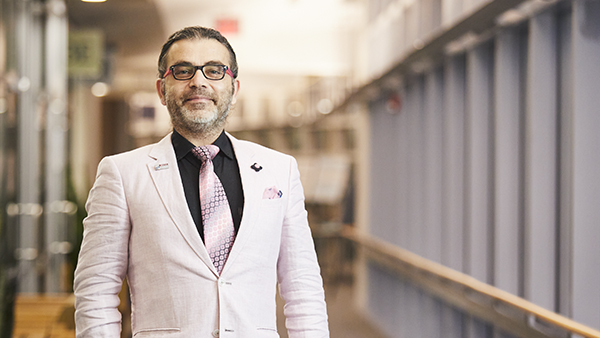 Dr. Bassem Elhassan, Co-Chief of the Shoulder Service, standing in the corridor in the Yawkey Building