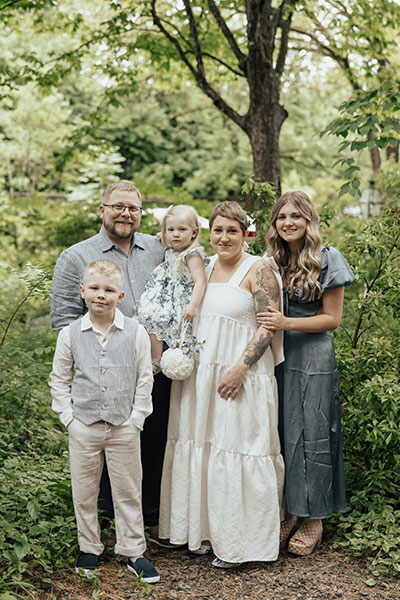 Shaw family celebrates June 2024 Vow Renewal. From left: Leo, Corey, Bonnie, Kelli, and Claire