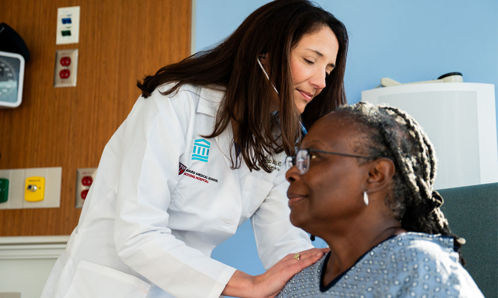 Kerry Reynolds, MD with a patient at the Mass General Cancer Center Kerry Reynolds, MD with a patient at the Mass General Cancer Center