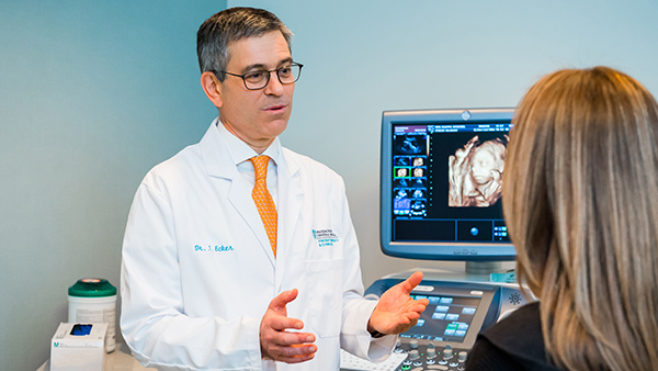 Dr. Jeffrey Ecker with patient