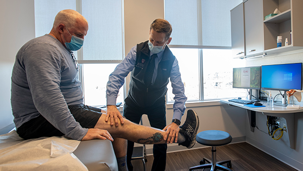 Scott Martin, MD, with a patient Scott Martin, MD, with a patient
